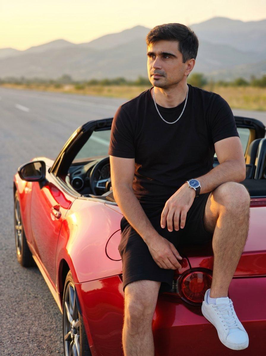 Aperçu du prompt: Homme dans une voiture de sport décapotable rouge