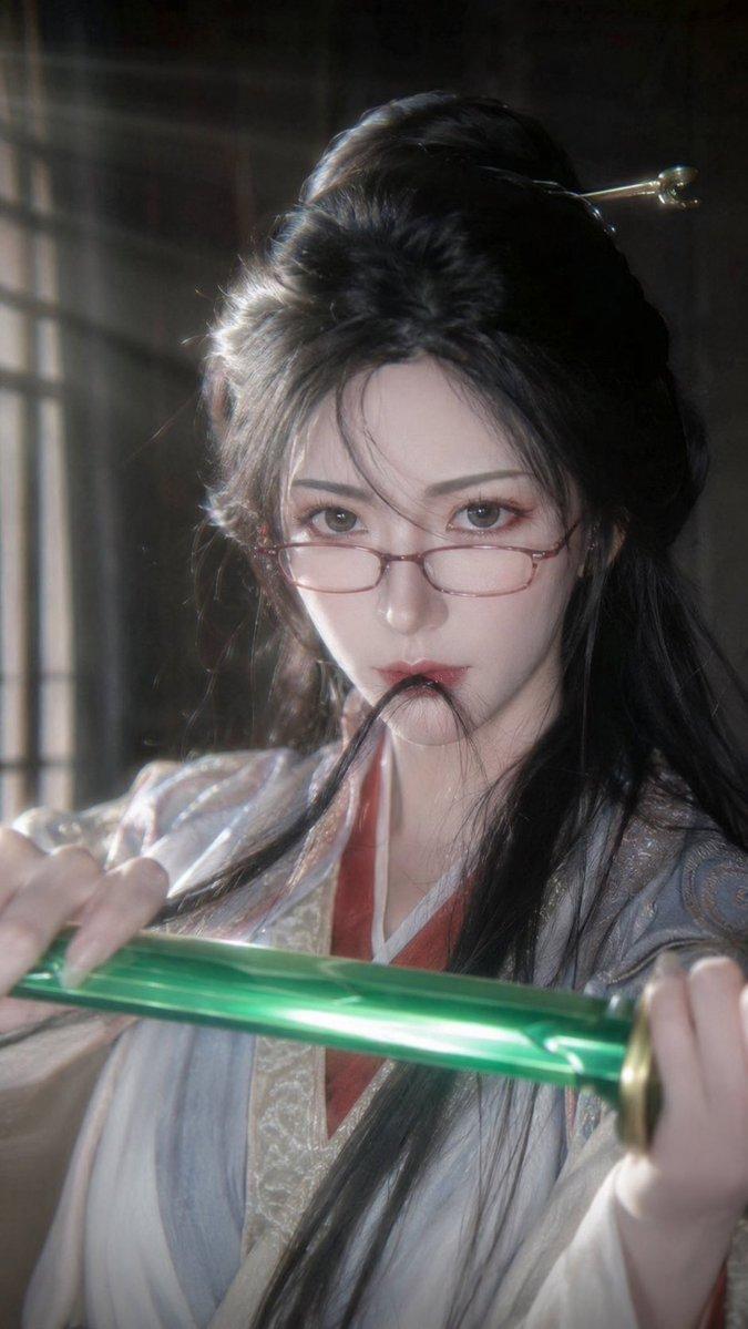 プロンプトのプレビュー: シネマティックな仙侠(せんきょう)風の女剣士のポートレート