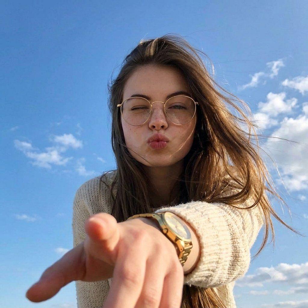 Prompt preview: Selfie-style photo taken from an outstretched arm's POV, reaching toward the camera with a wristwatc…