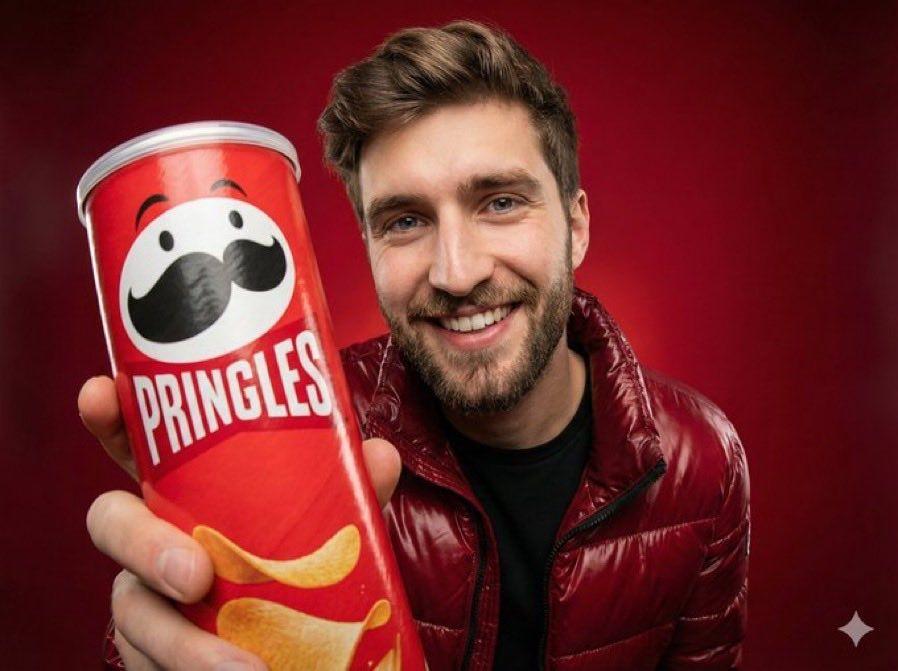 Preview ng prompt: Studio portrait of one smiling person holding a Cheetos Crunchy orange chips bag close to the camera…